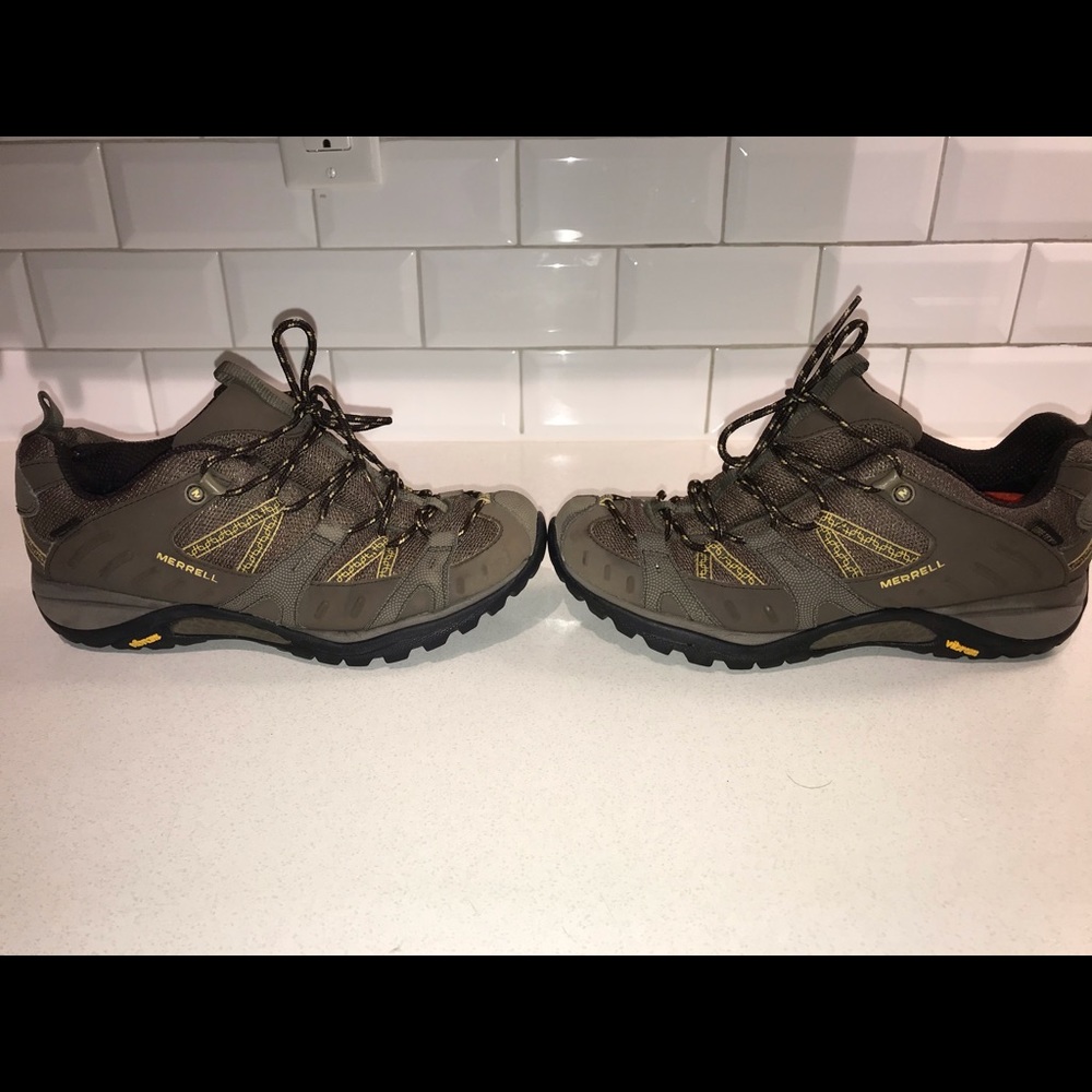 Merrell women trail shoes size 9.5. Brown